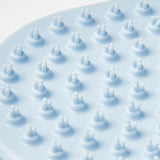 Dubbelzijdige verzorgingsborstel