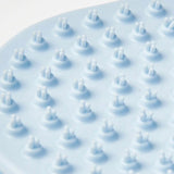 Dubbelzijdige verzorgingsborstel